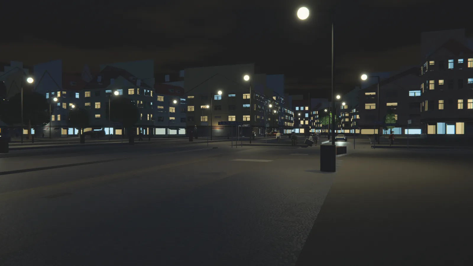 Landshüpf in MoodSwings bei Nacht: Straßenlaternen und erleuchtete Fenster entlang der Altstadt.